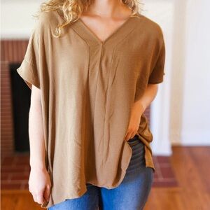 Tan colored blouse